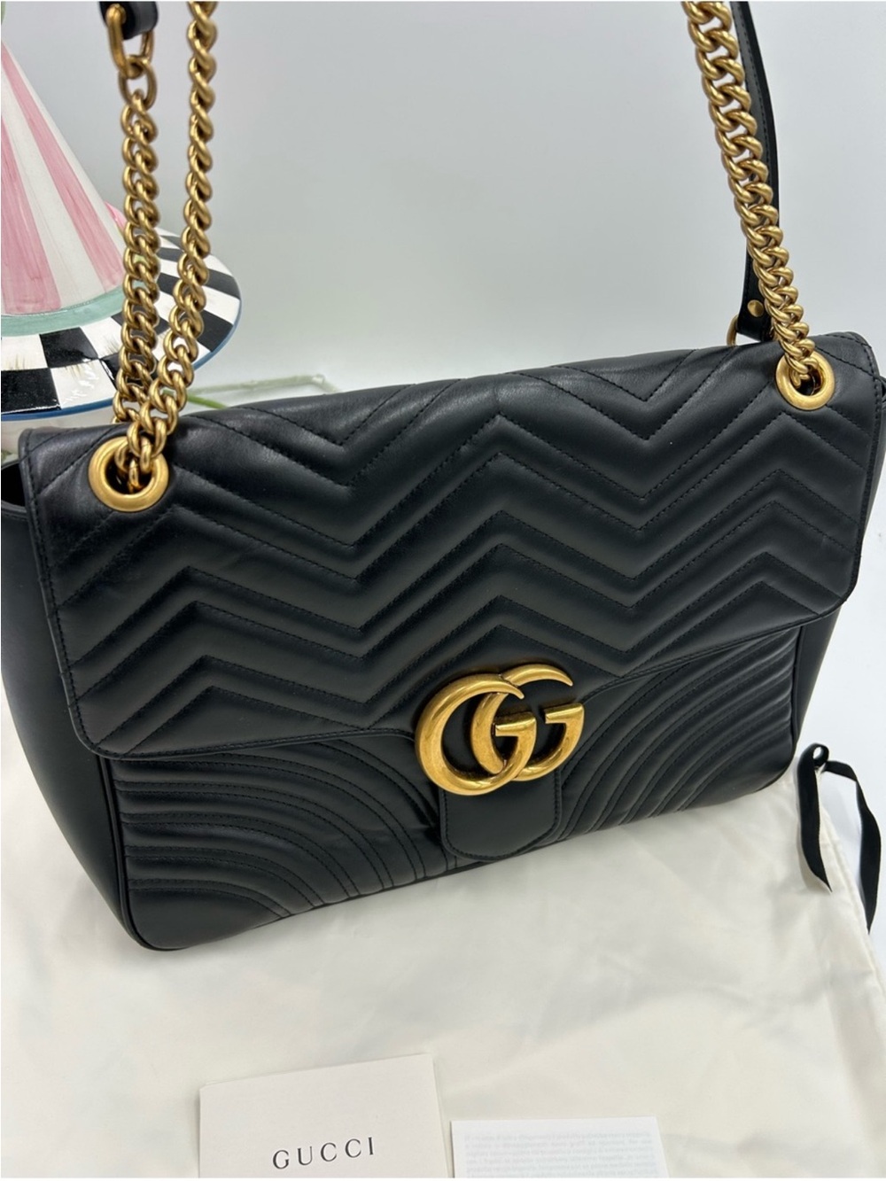 Women’s Gucci, large GG shoulder bag made in Italy. Black.